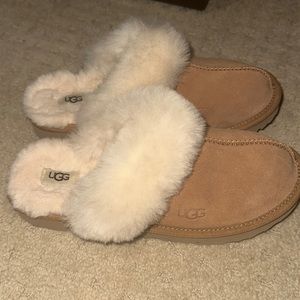 Brand new UGG slippers never worn